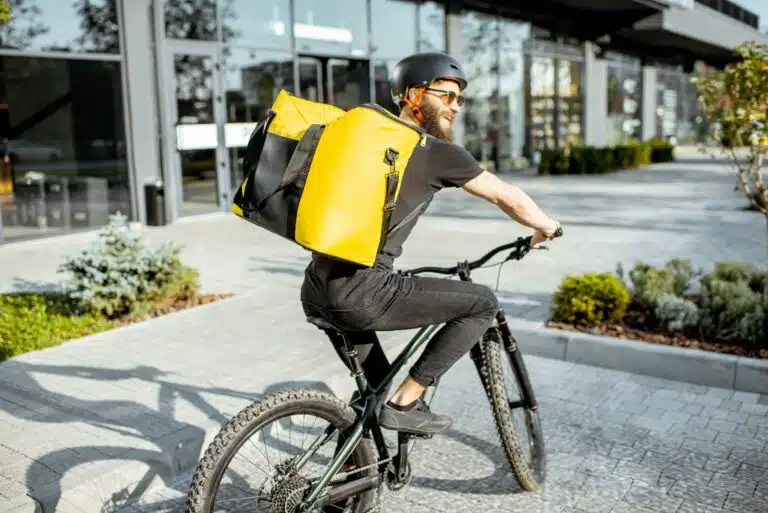 Courier delivering food on a bicycle